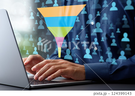 顧客行動データのマーケティングファネル分析。売上コンバージョン率の分析。オフィスのデスクでノートパソ 124399143