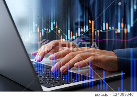 株式市場の価格チャートとグラフ。成功したトレード戦略と成長分析。ノートパソコンを使って株式に投資する 124399340