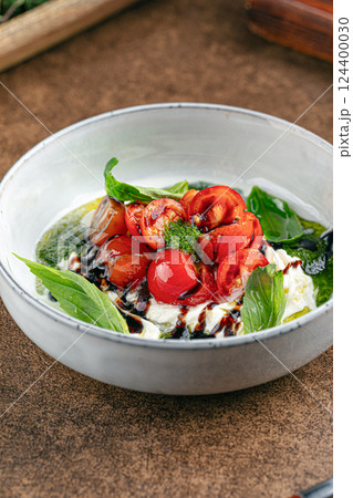 Gourmet appetizer with tomato and soft cheese Gourmet appetizer with tomato and soft cheese 124400030