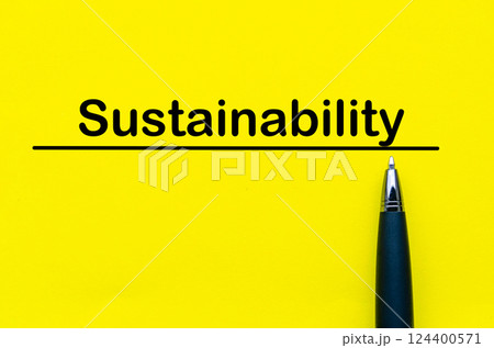 Sustainability text written on yellow cover background 124400571