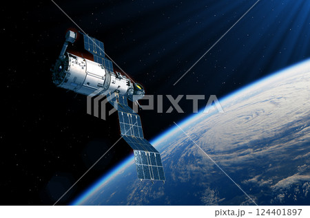 Space station deploys solar panels over planet Earth 124401897