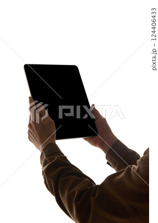 Person holding modern tablet with blank black screen isolated on white background. Mockup Person holding modern tablet with blank black screen isolated on white background. Mockup 124406433