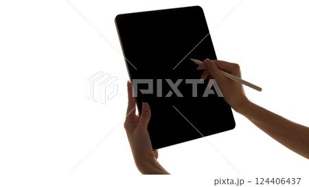 Person using stylus on tablet with dark screen isolated on white background. Ads of gadgets, accessories, apps, mockup. 124406437