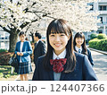 桜の木を背景に入学式の女子高生 124407366