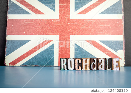 ROCHDALE. Urban Area in Great Britain. Flag and alphabet letters on wooden texture background 124408530