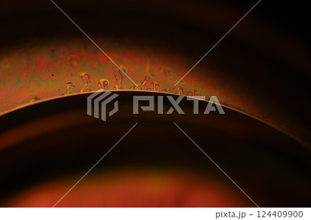 Green liquid surface, colourful abstract, surrealistic art, line of light, black background, beautiful scientific background 124409900