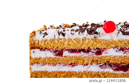 Delicious cake with chocolate sprinkles and cherry filling showing its layers 124411806