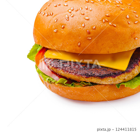 Juicy cheeseburger with fresh vegetables on sesame bun 124411815