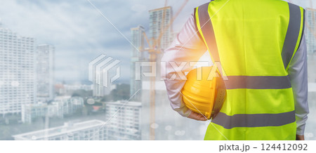 Civil engineer architect standing holding a safety helmet on construction and city background, Construction site plans to build high-rise buildings, Engineer building concept, Background of copy space Civil engineer architect standing holding a safety helmet on construction and city background, Construction site plans to build high-rise buildings, Engineer building concept, Background of copy space 124412092