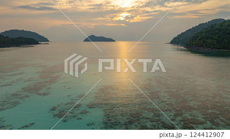 aerial view of stunning sunset above Ko Pachumba Surin Islands aerial view of stunning sunset above Ko Pachumba Surin Islands 124412907