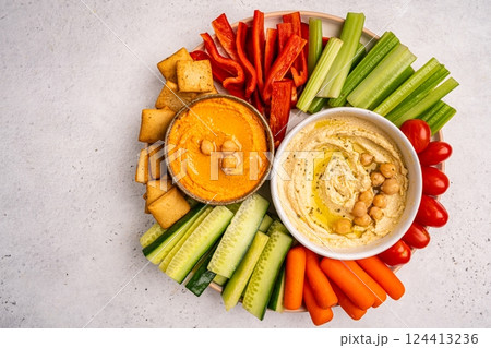 Various hummus dips, healthy and vegan snack Various hummus dips, healthy and vegan snack 124413236