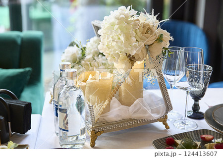 Wedding floral decor on the table in close-up 124413607