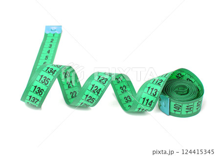 Green mint spiral tape measure diet isolated over white background clipping path. Green mint spiral tape measure diet isolated over white background clipping path. 124415345