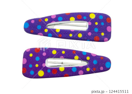 Colored hair clips isolated on white background. 124415511