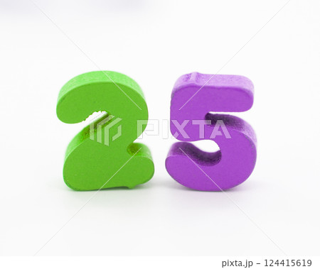 25 colorful wooden numbers decorative on the white 124415619