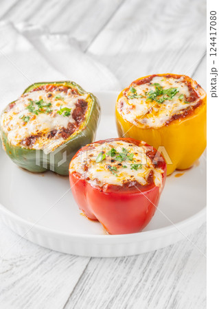 Juicy Baked Bell Peppers Stuffed with Flavorful Bolognese and Topped with Golden Mozzarella Juicy Baked Bell Peppers Stuffed with Flavorful Bolognese and Topped with Golden Mozzarella 124417080