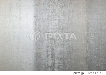 Subtle Silver Metallic Texture Background with Soft Reflections 124417145