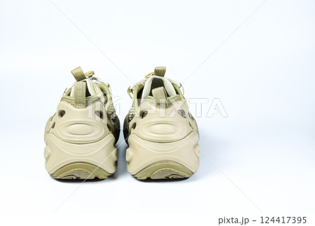 Heel side of Casual hiking shoes, trekking shoe isolate on white background. 124417395