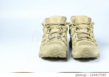 Toe side of tactical or hiking shoes, waterproof winter trekking shoe isolate on white background. 124417397
