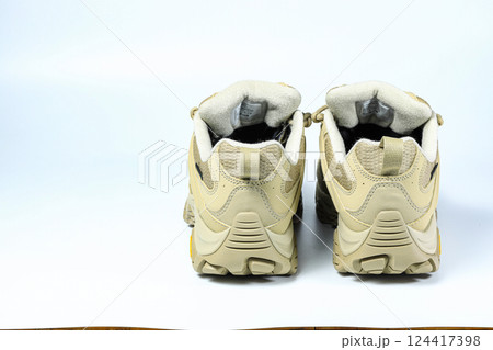 Heel side of tactical or hiking shoes, waterproof winter trekking shoe isolate on white background. 124417398