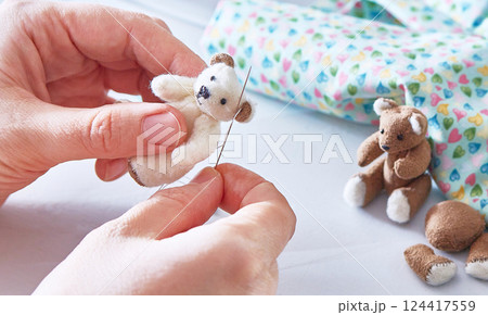 Handmade, the sewed toys, mini teddy-bear. Copy space 124417559