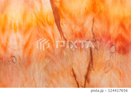 abstract pattern on silk fabric texture in yellow and brown tones 124417656
