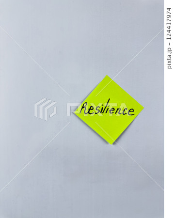 Sticky note with the word Resilience written on it, placed on a white background. Ideal for illustrating themes of strength, endurance, and perseverance. Great for concept creation Sticky note with the word Resilience written on it, placed on a white background. Ideal for illustrating themes of strength, endurance, and perseverance. Great for concept creation 124417974
