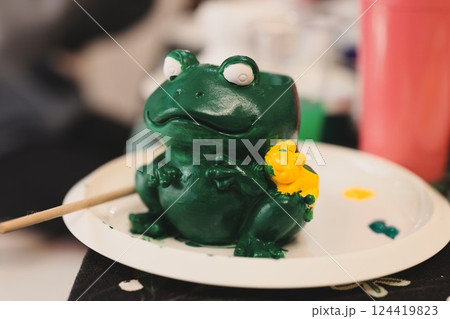 Enjoy making a Colorful and Beautiful Painted Frog Figurine Craft for fun and creative activity 124419823