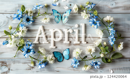 Vibrant blue and white spring flowers surrounding april with butterfly design 124420064