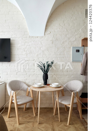 This Stylish Dining Space features a Minimalist Design that emphasizes clean lines and elegance This Stylish Dining Space features a Minimalist Design that emphasizes clean lines and elegance 124420376