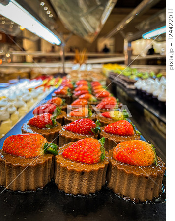 Strawberry tart on a shelf in a bakery, selective focus 124422011