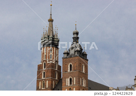 Historical church towers in Krakow captured in clear daylight. The medieval architecture 124422629