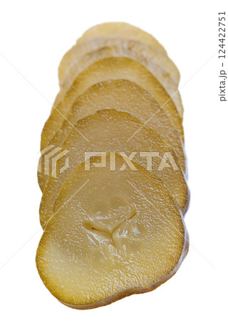 Fresh sliced green pickles isolated over white Fresh sliced green pickles isolated over white 124422751