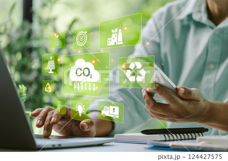 Finance manager implemented digital technology to monitor CO2 emissions, reducing risk and promoting sustainable energy practices for an eco-friendly future. sustainable, energy, co2, technology. 124427575