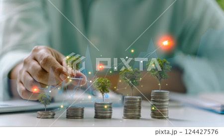 Green finance fosters business growth by channeling money and knowledge into eco-friendly energy projects, attracting financial investors. green, finance, business, money, growth, energy, eco. 124427576