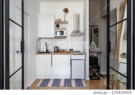 Modern Kitchen Interior Design Featuring an Open Layout for a Bright and Cozy Atmosphere Modern Kitchen Interior Design Featuring an Open Layout for a Bright and Cozy Atmosphere 124429404