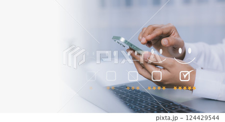 Customer review satisfaction feedback survey concept, Customer can evaluate quality of service leading to reputation ranking of business, User give rating to service experience on online application 124429544