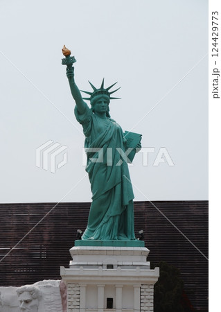 The iconic and magnificent Statue of Liberty located in New York City stands tall and proud The iconic and magnificent Statue of Liberty located in New York City stands tall and proud 124429773