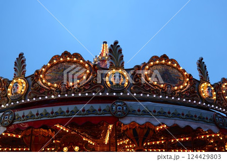 The Enchanting Carousel at Dusk A Dreamy Escape into a World of Whimsy and Delight 124429803
