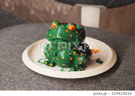 An EyeCatching and Colorful Ceramic Frog Sculpture Featuring a Unique and Playful Design 124429810