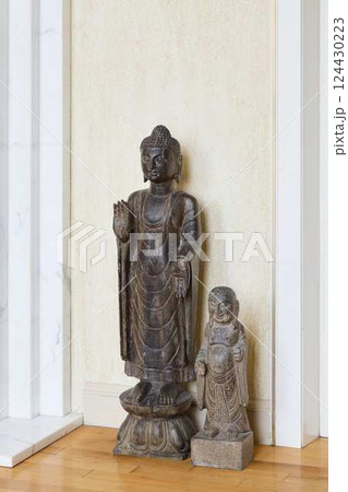 Discover the Beautiful and Elegant Buddhist Statues Perfectly Placed in a Contemporary Space 124430223