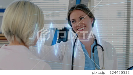 Image of cardiograph over caucasian female doctor examining her patient 124430532