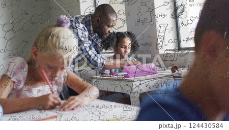 Image of chemical formula over diverse schoolchildren and teacher in classroom 124430584