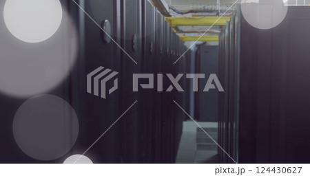 Image of spots of light and data processing over computer servers 124430627