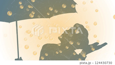 Silhouetted person holding umbrella over falling Bitcoin symbols, representing financial protection 124430730