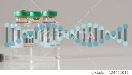 Image of dna strand over vials and syringe on white background 124431013