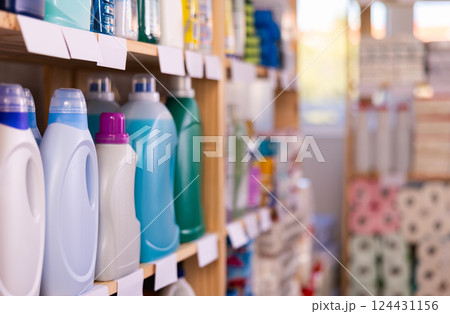 Shelf lined up with liquid detergent, household department assortment. 124431156