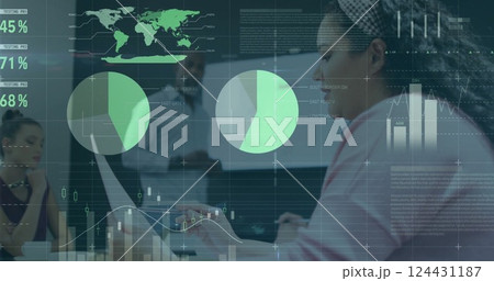 Image of financial data processing over diverse colleagues discussing work in office 124431187