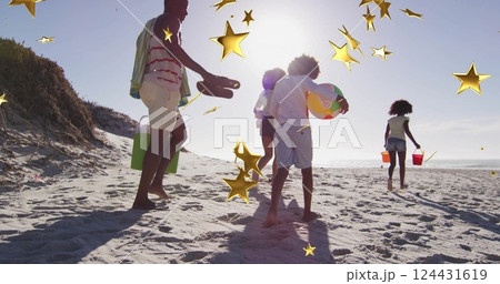 Walking on sandy beach, family enjoying summer vacation with star image 124431619