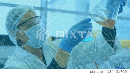 Image of mathematical equations over biracial female scientist working in lab 124431706